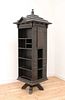 An American 'Tabard Inn Library' ebonised oak revolving bookcase,