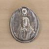 A Queen Anne Britannia standard silver alms badge,