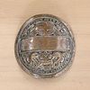 A silver-plated copper Free Waterman badge,