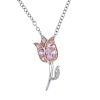 A sapphire and diamond floral pendant. The circular-shape pink sapphire tulip, with tapered stem and