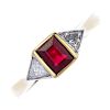An 18ct gold ruby and diamond three-stone ring. The rectangular-shape ruby, with triangular-shape di