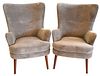 Pair of Contemporary Barrel Back Upholstered Wing Chairs, seat height 18 1/2 inches.
