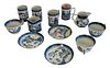 Twelve Piece Mottahedeh Blue Canton China, to include seven cups in two sizes, three saucer, and a creamer, tallest cup height 4 1/2 inches.
