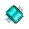 An emerald and diamond three-stone ring. The rectangular-shape emerald, to the square-shape diamond