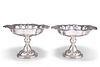 A NEAR PAIR OF EDWARDIAN SILVER COMPORTS, the first?by?James Henry & Herber