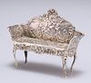 A GERMAN SILVER MINIATURE MODEL OF A SETTEE,?import marks, Berthold Muller,