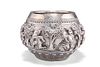 A BURMESE SILVER BOWL, unmarked, c.1880,?relief chased with a broad band of
