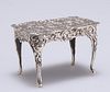 A GERMAN SILVER MINIATURE TABLE,?import marks, Berthold Muller, London 1896