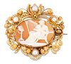 A 19TH CENTURY SHELL CAMEO BROOCH, carved depicting a seated mother and inf