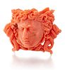 A CORAL CAMEO BROOCH,?finely carved in high relief depicting the head of Me