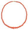 A CORAL NECKLACE, graduated coral beads knotted to a reeded ball clasp, mar