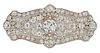 AN EARLY 20TH CENTURY DIAMOND BROOCH PENDANT, the finely pierced lozenge sh