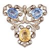 AN EARLY 20TH CENTURY COLOURED SAPPHIRE AND DIAMOND BROOCH, two cushion-cut