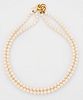 A 9 CARAT GOLD CULTURED PEARL NECKLACE, two strands of uniform cultured pea
