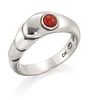 OLE KORTZAU FOR GEORG JENSEN - A DANISH SILVER CORAL RING, no. 362,?a round