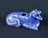An 18th/19th century blue glazed beast water dropper, the roaring mouth of the reclining beast formi