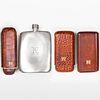Group of Three Leather Cigar Cases and a Brooks Brother's Pewter Flask
