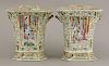 A pair of Canton enamel Bough Pots and Covers,<BR>c.1860, the panels of figures in interiors and in