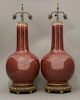 A pair of sang-de-boeuf Vases,<BR>20th century, the onion-shaped body under an even-toned glaze of b