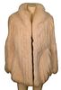 White Rabbit Fur Car Coat, having stand up collar, side slip pockets and front toggle closure, fur is supple, size medium. 