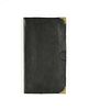 A MAGIC BLACK LEATHER WALLET WITH BRASS CORNER GUARDS, MODERN, 
