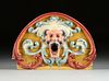 A RENAISSANCE REVIVAL PAINTED WOOD CIRCUS WAGON GROTESQUE MASK PANEL, LATE 19TH CENTURY,