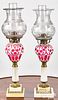 Pair of white cut to red overlay glass fluid lamps