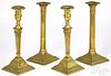 Two pairs of English columnar brass candlesticks