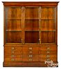 Large mahogany campaign style display cabinet