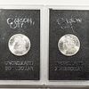 Two GSA issued Morgan Dollars