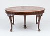 GEORGE III STYLE CARVED MAHOGANY EXTENSION DINING TABLE
