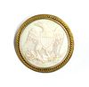 A gold mounted shell cameo brooch,