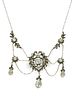 An early 20th century silver paste and marcasite set swag necklace,