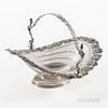Dominick & Haff Sterling Silver Basket, New York, c. 1899, bust of a woman on each side of a hinged handle, floral rim, reticulated bod