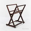 Mahogany Print Rack, on casters, folds inwards on brass hinge at one side, ht. 37 1/2, lg. 30 1/2, wd. 23 in. Provenance: Townshend Col