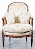 * A Louis XV Style Walnut Bergere Height 36 1/2 inches.