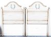 * A Pair of Neoclassical Painted Headboards Height 64 inches.