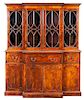 A Regency Style Mahogany Breakfront Height 79 1/4 x width 63 x depth 17 3/4 inches.