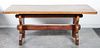A Provincial Style Dining Table. Length 72 inches.