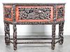 * A Chinese Carved and Lacquered Console Cabinet Height 40 1/4 x width 57 x depth 16 1/2 inches.