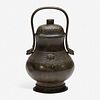 A Chinese archaistic patinated bronze covered wine vessel, you 倣古风格卣 late Ming/Qing dynasty 明末或清初