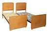 A pair of Art Deco maple single beds,