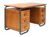 An oak and tubular-framed desk,