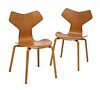 A pair of teak 'Grand Prix' chairs,