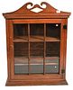 Primitive Cabinet 
having broken arch top over one door with recessed panel side
height 36 1/2 inches, top 27 3/4 inches