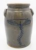 T. Weaver Four Gallon Stoneware Crock
having tall blue flower
height 14 1/2 inches
Provenance: Estate of Bruce Sasalla, East Hartford, Connecticut.