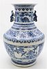 Large Chinese Blue and White Urn
having flared rim over dragon handles with bulbous body, 
painted flowers and panel scenes with birds and flowers
hei