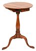 Cherry Round Top Candle Stand
having drawer on turned shaft
set on tripod base
height 26 3/4 inches, top 18 x 18 3/4 inches 
Provenance: Fifty Year Pe