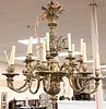 Bronze Sixteen Light Chandelier
having eight foliate stylized double arms with two lights per arm
height 49 inches, diameter 36 inches
Provenance: Col