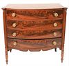 Sheraton Mahogany Four Drawer Chest having bowed front and turret corners circa 1830 height 38 1/2 inches, top 19 1/2 x 41 inches 
